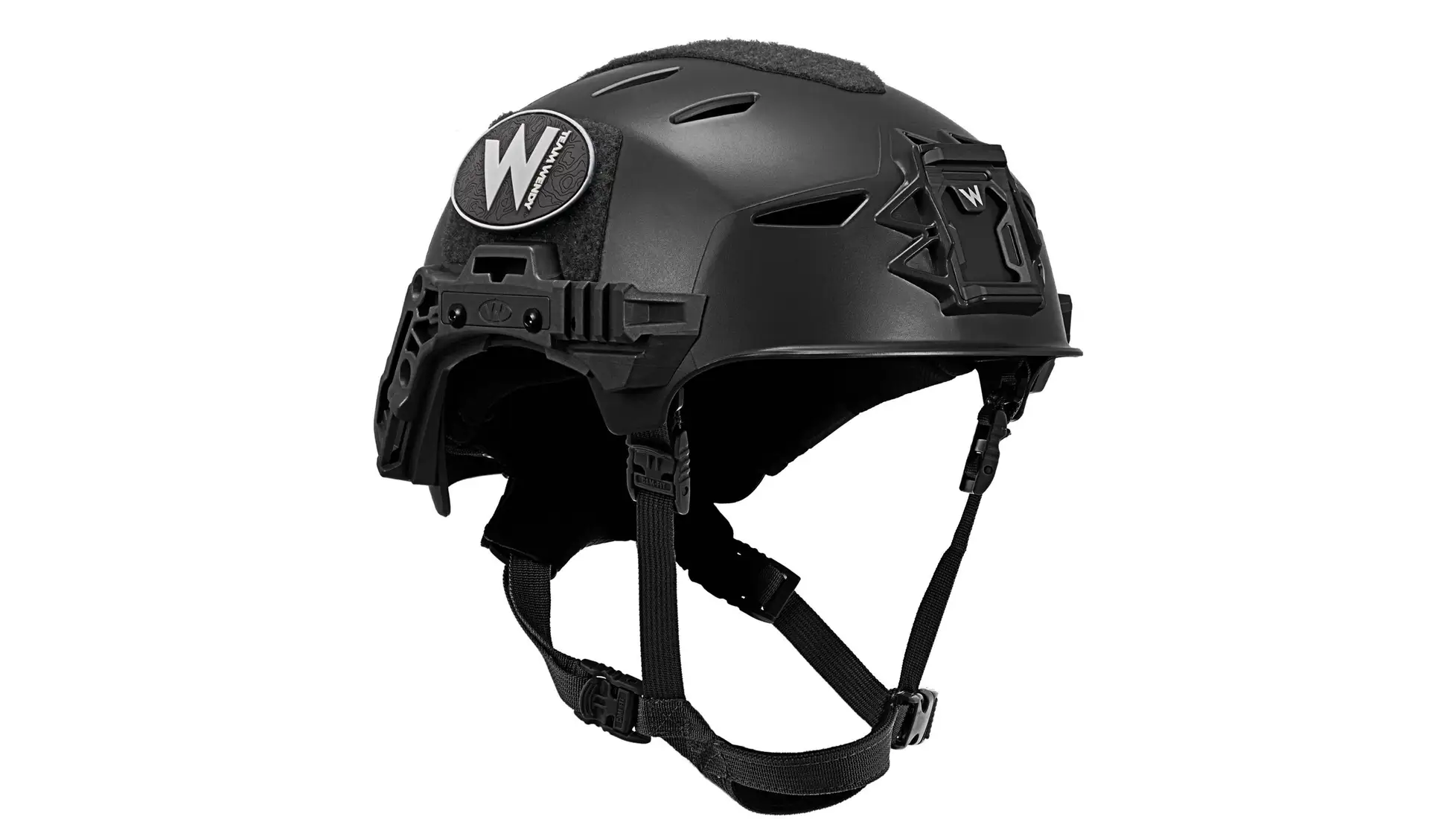 Black helmet with vent holes, side rails, a front shroud mount, chin harness and a round W logo patch on the side; the retailer's lead image for this listing